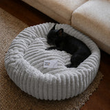 Cama tipo dona para perro | borde alto, base antideslizante