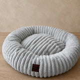 Cama tipo dona para perro | borde alto, base antideslizante
